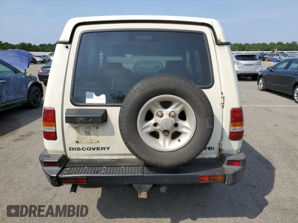 1998 Land Rover Discovery SD z VIN SALJY1246WA781850, wystawiony jako Copart lot #69113644 z przebiegiem 58 468 mil mil oraz Czysty tytuł • Clean title. Historia ofert i sprzedaży dostępna na DreamBid. Obrazek 6.