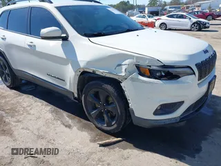 2019 Jeep Cherokee Latitude Plus with VIN 1C4PJLLB2KD296144, listed as a IAAI auction lot 41681051 with 199,698 mi miles and . Bid and sale history available at DreamBid. Image 6.