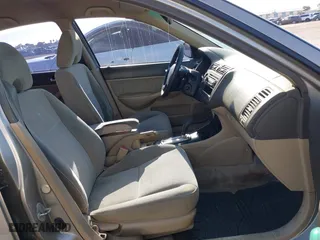 2003 Honda Civic LX with VIN 2HGES16563H521654, listed as a IAAI auction lot 42094679 with 157,031 mi miles. Bid and sale history available at carsss.com. Image 5.