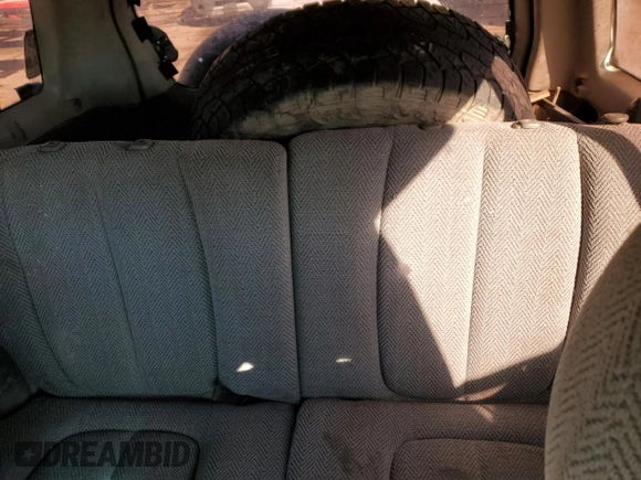 1999 Suzuki Grand Vitara JLX z VIN JS3TD62V0X4113058, wystawiony jako Copart lot #80089884 z przebiegiem 165 794 mil mil oraz Szkoda całkowita • Salvage title. Historia ofert i sprzedaży dostępna na DreamBid. Obrazek 10.