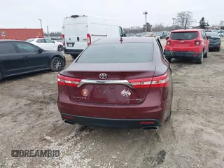 2015 Toyota Avalon Limited with VIN 4T1BK1EB7FU167777, listed as a IAAI auction lot 41457339 with 98,239 mi miles and . Bid and sale history available at DreamBid. Image 16.