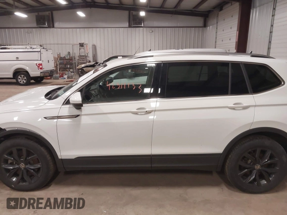 2024 Volkswagen Tiguan SE with VIN 3VVMB7AX6RM135219, listed as a IAAI auction lot 42311133 with 7,885 mi miles and . Bid and sale history available at DreamBid. Image 14.