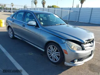 2009 Mercedes-Benz C-Class 3.0L Sport with VIN WDDGF54X19R060238, listed as a IAAI auction lot 41861044 with 136,036 mi miles. Bid and sale history available at carsss.com. Image 1.