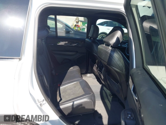 2023 Jeep Grand Cherokee Laredo with VIN 1C4RJHAG1PC515399, listed as a IAAI auction lot 41929215 with 27,986 mi miles and . Bid and sale history available at DreamBid. Image 8.