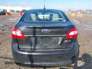 2013 Ford Fiesta S z VIN 3FADP4AJ2DM129703, wystawiony jako IAAI lot #41669041 z przebiegiem 138 831 mil mil oraz . Historia ofert i sprzedaży dostępna na DreamBid. Obrazek 16.