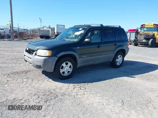 2001 Ford Escape XLT with VIN 1FMCU04161KC38571, listed as a IAAI auction lot 41881685 with 175,432 mi miles and . Bid and sale history available at DreamBid. Image 2.