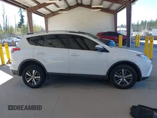2018 Toyota RAV4 XLE with VIN JTMRFREVXJD240388, listed as a IAAI auction lot 42052065 with 117,114 mi miles. Bid and sale history available at carsss.com. Image 14.