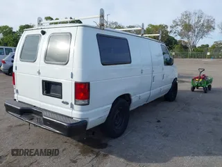 2001 Ford Econoline Cargo with VIN 1FTRE14291HA84414, listed as a IAAI auction lot 41463623 with 192,835 mi miles. Bid and sale history available at carsss.com. Image 12.