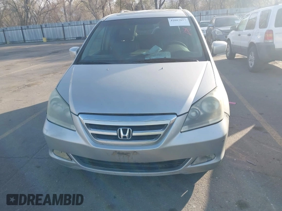 2005 Honda Odyssey TOURING with VIN 5FNRL38875B004209, listed as a IAAI auction lot 42003057 with 242,794 mi miles. Bid and sale history available at carsss.com. Image 6.