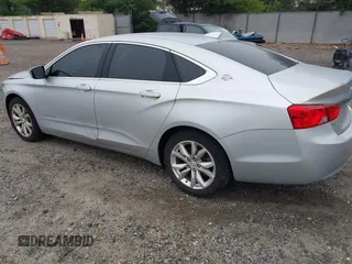 2018 Chevrolet Impala LT with VIN 1G1105S39JU135456, listed as a IAAI auction lot 42360696 with 124,176 mi miles and . Bid and sale history available at DreamBid. Image 3.