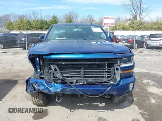 2017 Chevrolet Silverado 1500 LT with VIN 3GCUKREC5HG363503, listed as a IAAI auction lot 41833304 with 133,130 mi miles and . Bid and sale history available at DreamBid. Image 11.