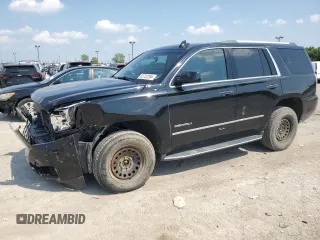 2018 GMC Yukon Denali with VIN 1GKS2CKJ0JR286833, listed as a Copart auction lot 65722294 with 103,798 mi miles and Salvage Title. Bid and sale history available at carsss.com. Image 1.