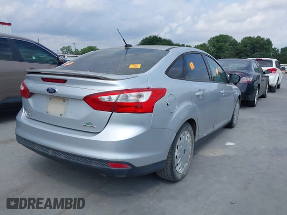 2013 Ford Focus SE with VIN 1FADP3F25DL138117, listed as a IAAI auction lot 42162119 with 136,979 mi miles. Bid and sale history available at carsss.com. Image 4.