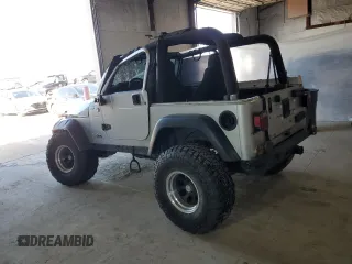 2006 Jeep Wrangler Rubicon with VIN 1J4FA69S26P734731, listed as a Copart auction lot 52009295 with 117,872 mi miles and Salvage title. Bid and sale history available at DreamBid. Image 2.