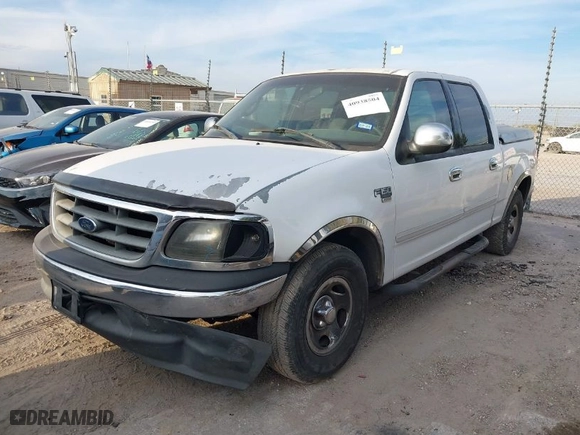2001 Ford F-150 SuperCrew XLT with VIN 1FTRW07L91KB32833, listed as a IAAI auction lot 40938504 with NaN miles. Bid and sale history available at carsss.com. Image 2.