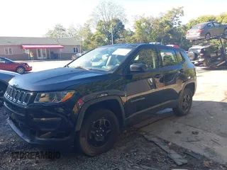 2021 Jeep Compass Sport with VIN 3C4NJDAB9MT591500, listed as a IAAI auction lot 40517034 with 58,230 mi miles and . Bid and sale history available at DreamBid. Image 2.
