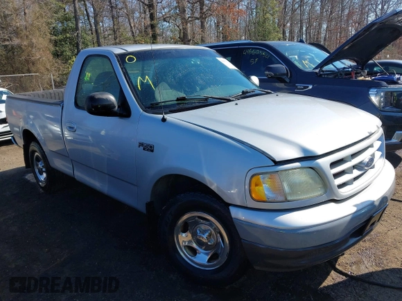 2002 Ford F-150 XL with VIN 1FTRF17222NC00760, listed as a IAAI auction lot 41653940 with 314,637 mi miles. Bid and sale history available at carsss.com. Image 1.