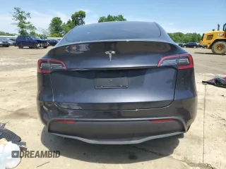 2024 Tesla Model Y with VIN 7SAYGDED6RF091715, listed as a Copart auction lot 56535585 with 23,120 mi miles and Salvage title. Bid and sale history available at DreamBid. Image 6.