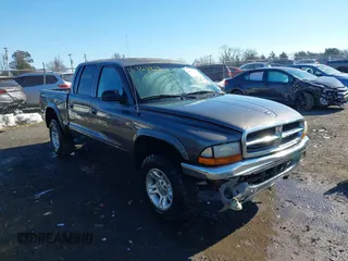 2001 Dodge Dakota z VIN 1B7HG2AX41S305657, wystawiony jako IAAI lot #41363614 z przebiegiem 193 524 mil mil oraz . Historia ofert i sprzedaży dostępna na DreamBid. Obrazek 1.