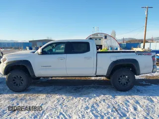 2021 Toyota Tacoma 4WD SR5 with VIN 3TMDZ5BN6MM105593, listed as a IAAI auction lot 41424096 with 39,215 mi miles. Bid and sale history available at carsss.com. Image 15.
