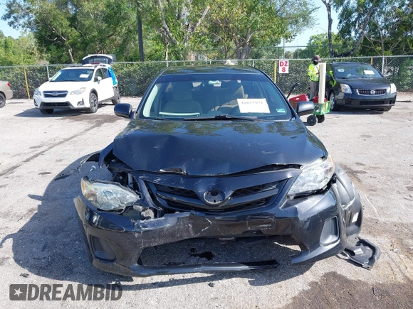 2012 Toyota Corolla L with VIN 2T1BU4EE9CC915917, listed as a IAAI auction lot 42017971 with 86,524 mi miles. Bid and sale history available at carsss.com. Image 6.