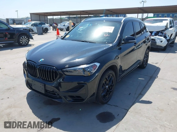 2021 BMW X1 sDrive28i with VIN WBXJG7C07M3M65841, listed as a IAAI auction lot 41877032 with 79,817 mi miles and . Bid and sale history available at DreamBid. Image 2.