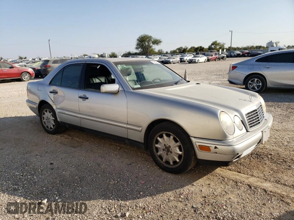1998 Mercedes-Benz E-Class with VIN WDBJF65F1WA711193, listed as a Copart auction lot 76052034 with 168,935 mi miles and Salvage Title. Bid and sale history available at carsss.com. Image 4.