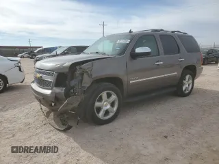 2014 Chevrolet Tahoe LTZ z VIN 1GNSCCE00ER107358, wystawiony jako Copart lot #82124384 z przebiegiem 208 687 mil mil oraz Szkoda całkowita • Salvage title. Historia ofert i sprzedaży dostępna na DreamBid. Obrazek 1.