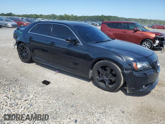 2013 Chrysler 300 SRT-8 with VIN 2C3CCAFJ9DH731557, listed as a Copart auction lot 69700344 with 174,242 mi miles and Salvage Title. Bid and sale history available at DreamBid. Image 4.