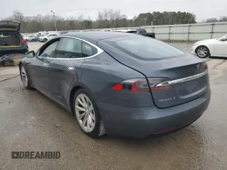 2016 Tesla Model S 90D with VIN 5YJSA1E20GF168108, listed as a Copart auction lot 55589615 with 138,295 mi miles and Salvage Title. Bid and sale history available at DreamBid. Image 2.