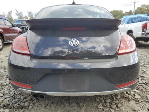 2018 Volkswagen Beetle Dune with VIN 3VWSD7AT4JM709024, listed as a Copart auction lot 73713754 with 50,879 mi miles and Salvage Title. Bid and sale history available at carsss.com. Image 6.