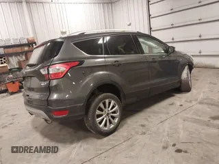 2017 Ford Escape Titanium with VIN 1FMCU9JD7HUE46427, listed as a IAAI auction lot 41808083 with 55,201 mi miles. Bid and sale history available at carsss.com. Image 4.