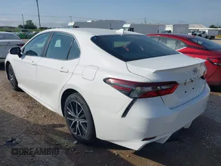 2023 Toyota Camry SE with VIN 4T1G11AK2PU749916, listed as a IAAI auction lot 42014107 with 61,561 mi miles. Bid and sale history available at carsss.com. Image 3.