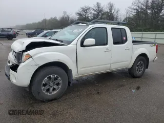 2017 Nissan Frontier Pro-4X with VIN 1N6AD0EV7HN703636, listed as a Copart auction lot 61259465 with 165,302 mi miles and Salvage title. Bid and sale history available at DreamBid. Image 1.