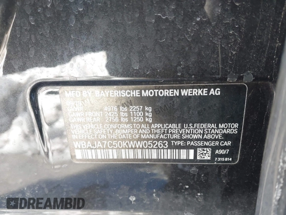 2019 BMW 5 Series 530i xDrive with VIN WBAJA7C50KWW05263, listed as a IAAI auction lot 41571583 with 71,185 mi miles and . Bid and sale history available at DreamBid. Image 9.