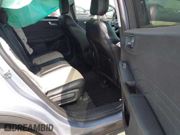 2022 Ford Escape Titanium with VIN 1FMCU9J94NUB57495, listed as a IAAI auction lot 42530044 with 27,075 mi miles and . Bid and sale history available at DreamBid. Image 8.