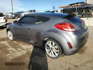 2013 Hyundai Veloster w/Black Int z VIN KMHTC6AD0DU135773, wystawiony jako Copart lot #41367875 z przebiegiem 96 487 mil mil oraz Szkoda całkowita • Salvage title. Historia ofert i sprzedaży dostępna na DreamBid. Obrazek 2.