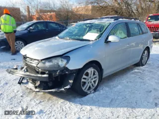 2014 Volkswagen Jetta SportWagen TDI w/Sunroof & Nav with VIN 3VWPL7AJ2EM613843, listed as a IAAI auction lot 41391420 with 134,461 mi miles. Bid and sale history available at carsss.com. Image 2.