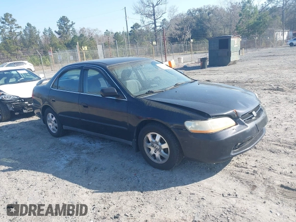 1998 Honda Accord LX z VIN 1HGCG5641WA215469, wystawiony jako IAAI lot #41801430 z przebiegiem 228 903 mil mil oraz . Historia ofert i sprzedaży dostępna na DreamBid. Obrazek 1.
