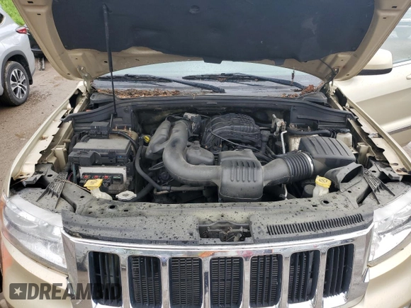 2011 Jeep Grand Cherokee Laredo z VIN 1J4RR4GG0BC562824, wystawiony jako Copart lot #61625445 z przebiegiem 166 490 mil mil oraz Czysty tytuł • Clean title. Historia ofert i sprzedaży dostępna na DreamBid. Obrazek 12.