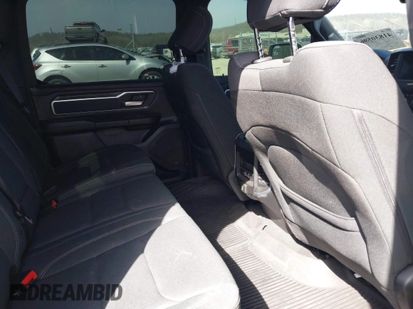 2021 Ram 1500 Big Horn with VIN 1C6SRFFT0MN521027, listed as a IAAI auction lot 41830596 with 55,013 mi miles and . Bid and sale history available at DreamBid. Image 8.