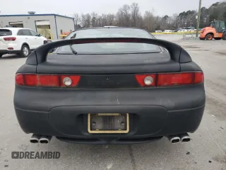 1998 Mitsubishi 3000GT z VIN JA3AM44H8WY000594, wystawiony jako Copart lot #44164155 z przebiegiem 92 227 mil mil oraz Czysty tytuł • Clean title. Historia ofert i sprzedaży dostępna na DreamBid. Obrazek 6.
