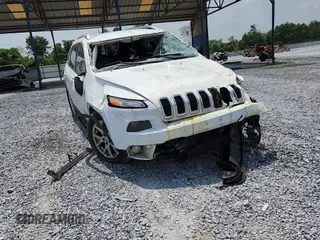2016 Jeep Cherokee Latitude z VIN 1C4PJLCB9GW302114, wystawiony jako Copart lot #59312465 z przebiegiem 160 040 mil mil oraz Szkoda całkowita • Salvage title. Historia ofert i sprzedaży dostępna na DreamBid. Obrazek 14.
