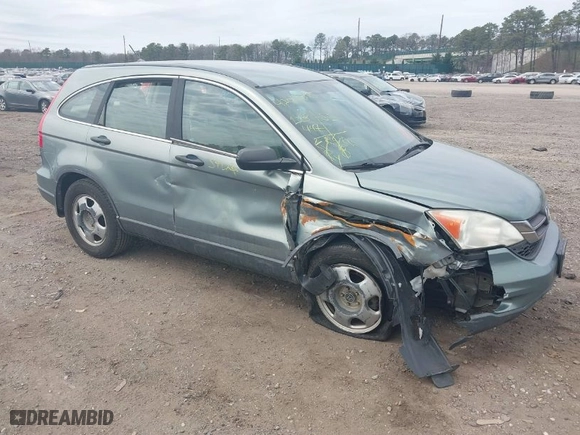 2011 Honda CR-V LX with VIN 5J6RE3H37BL008665, listed as a IAAI auction lot 42060005 with 128,447 mi miles. Bid and sale history available at carsss.com. Image 1.