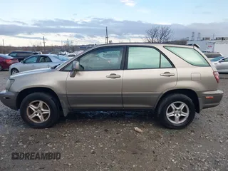 1999 Lexus RX 300 Luxury SUV with VIN JT6HF10U7X0090467, listed as a IAAI auction lot 41792768 with 263,408 mi miles. Bid and sale history available at carsss.com. Image 13.