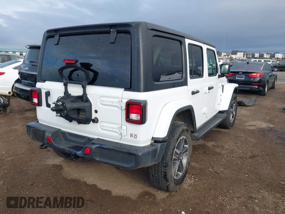 2023 Jeep Wrangler Sahara with VIN 1C4HJXEN7PW701607, listed as a IAAI auction lot 41774580 with 13,376 mi miles. Bid and sale history available at carsss.com. Image 4.