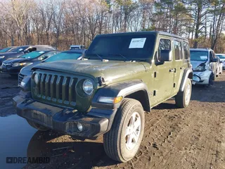 2022 Jeep Wrangler Unlimited Sport S with VIN 1C4HJXDG2NW262462, listed as a IAAI auction lot 41199711 with 1 mi miles. Bid and sale history available at carsss.com. Image 2.