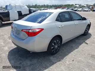 2015 Toyota Corolla L with VIN 2T1BURHE0FC431728, listed as a IAAI auction lot 41932169 with 121,355 mi miles. Bid and sale history available at carsss.com. Image 4.