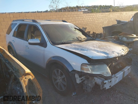 2008 Ford Taurus X SEL z VIN 1FMDK05W38GA32822, wystawiony jako IAAI lot #41630130 z przebiegiem Nie podano mil oraz . Historia ofert i sprzedaży dostępna na DreamBid. Obrazek 13.
