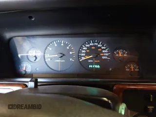 1996 Jeep Grand Cherokee Laredo with VIN 1J4GZ58S9TC293787, listed as a IAAI auction lot 41179368 with 141,755 mi miles. Bid and sale history available at carsss.com. Image 7.